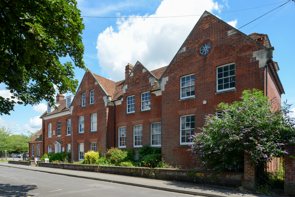 Red brick building with a blue sky behind